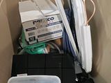 a cardboard box with a bunch of items inside of it
