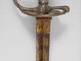 a sword that is on display on a wall