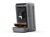 a close up of a coffee machine with two cups of coffee