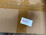 a cardboard box with a price tag on it sitting on a table