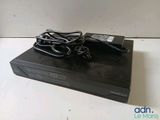 an image of a black dvd player sitting on top of a table