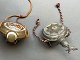 two different types of fishing reels that are on the table