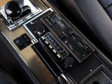 an image of a car dashboard with a radio and other electronics