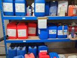 a shelf full of various containers and containers on it