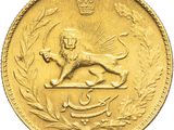 a close up of a gold coin with a lion on it