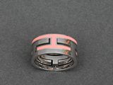 a close up of a ring on a black surface