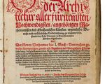 un vieux livre sur lequel figurent des inscriptions rouges et noires