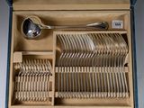 a box with a bunch of silverware inside of it