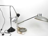 a lamp that is sitting on a table next to a lamp
