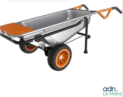 une image représentant une brouette aux roues orange sur fond blanc