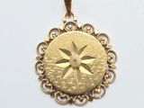 an image of a gold pendant with a star in the center