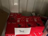many boxes of beer sitting on a shelf in a closet