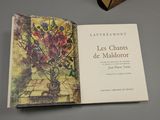 a book with a picture of a vase of flowers on it