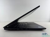 an open laptop computer sitting on top of a white table