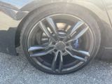 a close up of a tire on a car ' s rim