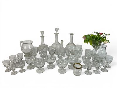 a lot of glass items that are sitting on a table