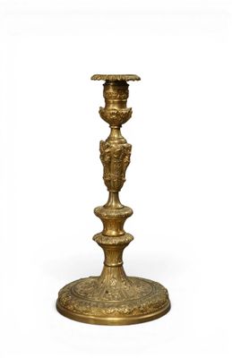 an image of a gold colored candle holder on a white background