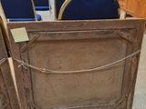 two wooden chairs that are sitting in a room
