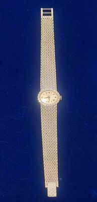 an image of a watch in a box on a table
