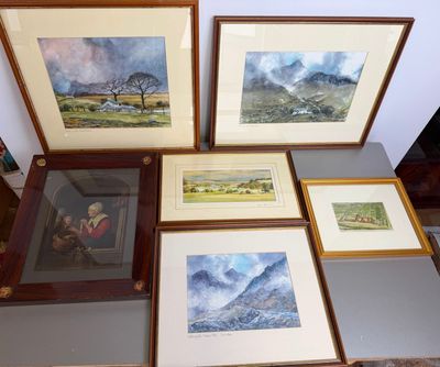 four framed pictures of mountains and a man sitting on a bench