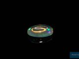 an image of a black background with a frisbee in the dark
