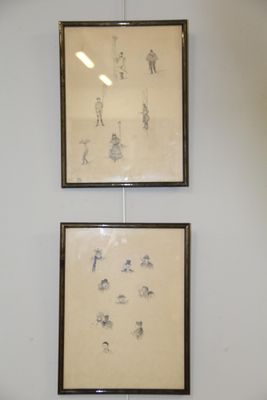 two framed pictures hanging on the wall of a room
