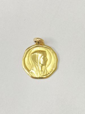 an image of a gold coin with a woman ' s face on it