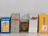 many boxes of cigarettes lined up on a shelf