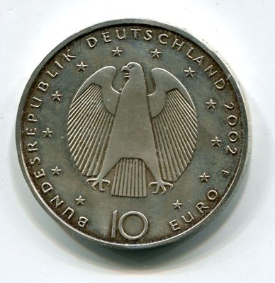 an image of a german 10 euro coin on a white surface