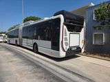 a bus that is parked on the side of the road