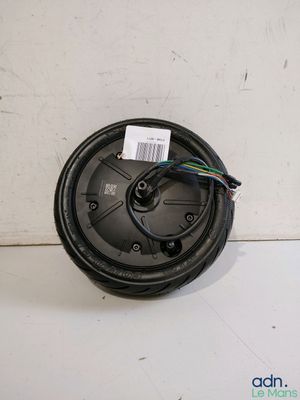 a close up of a speaker with wires attached to it