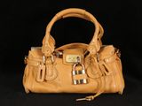 Sac à main en cuir beige Michael Korsch avec cadenas et clé
