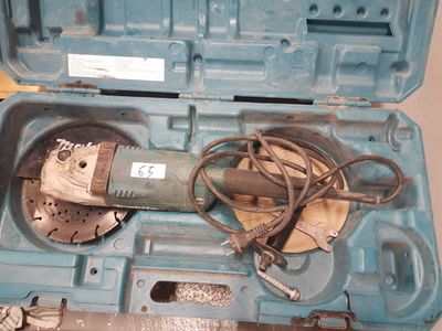 a tool in a blue case on a table