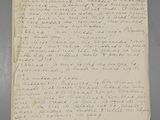 a piece of paper with writing on it sitting on top of a table