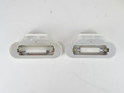 pair of white plastic door handles for a car or truck