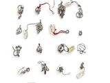 many different types of christmas ornaments on a white surface