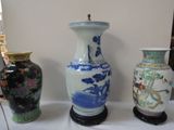 three vases that are sitting on a table