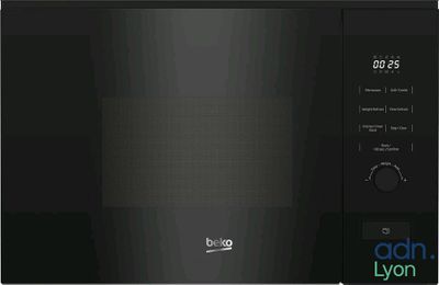 the black microwave oven has a digital display on the door