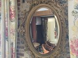 a mirror hanging on the wall in a living room