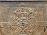 an old wooden box with a decorative design on it