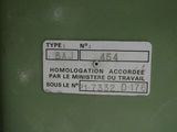 a label on the side of a green machine