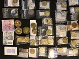 a lot of coins that are sitting on a table