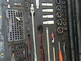 many tools in the case that are sitting on the table