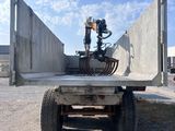 an image of a truck with a crane on the back of it