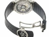 a watch with a black band and a silver buckle
