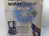 a box of water flosser sitting on a table