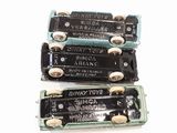 three batteries that are sitting on top of each other