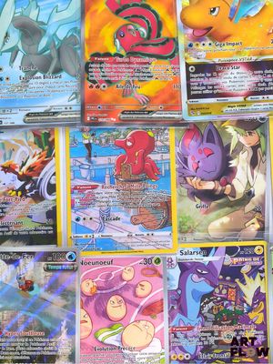 a lot of different pokemon cards on the table