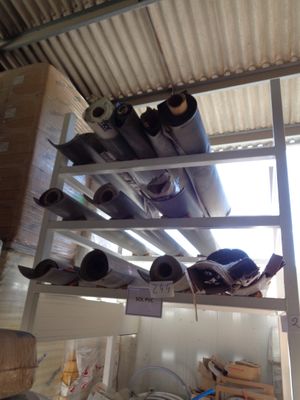 a rack with many different types of pipes on it
