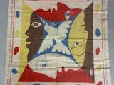 an old handkerchief with a picture of a woman and a bird